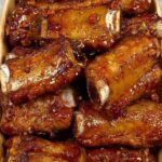 Sticky Honey Garlic Ribs – Fall-Off-The-Bone Tender!